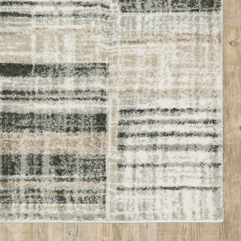 3' X 5' Grey Charcoal Ivory Tan Brown And Beige Geometric Power Loom Stain Resistant Area Rug